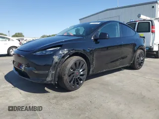 2023 Tesla Model Y Long Range z VIN 7SAYGAEE7PF859030, wystawiony jako Copart lot #58965185 z przebiegiem 18 421 mil mil oraz Czysty tytuł • Clean title. Historia ofert i sprzedaży dostępna na DreamBid. Obrazek 1.