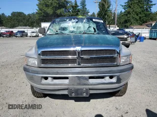 1999 Dodge 2500 z VIN 1B7KF2360XJ585301, wystawiony jako Copart lot #58319385 z przebiegiem 318 952 mil mil oraz Szkoda całkowita • Salvage title. Historia ofert i sprzedaży dostępna na DreamBid. Obrazek 5.
