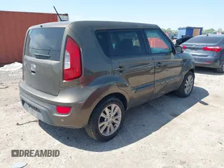 2012 Kia Soul + with VIN KNDJT2A69C7403710, listed as a IAAI auction lot 41916201 with 163,064 mi miles. Bid and sale history available at carsss.com. Image 4.