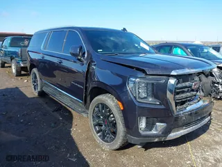 2022 GMC Yukon XL SLT with VIN 1GKS2GKDXNR134694, listed as a IAAI auction lot 41475723 with 52,579 mi miles. Bid and sale history available at carsss.com. Image 1.