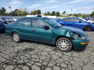 1996 Chevrolet Prizm z VIN 1Y1SK5285TZ058572, wystawiony jako Copart lot #51303845 z przebiegiem 87 109 mil mil oraz Szkoda całkowita • Salvage title. Historia ofert i sprzedaży dostępna na DreamBid. Obrazek 4.