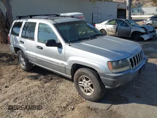 2002 Jeep Grand Cherokee with VIN 1J8GW48N02C277696, listed as a IAAI auction lot 41867302 with 184,502 mi miles and . Bid and sale history available at DreamBid. Image 1.