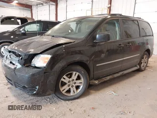 2010 Dodge Grand Caravan Crew with VIN 2D4RN6DX1AR438135, listed as a IAAI auction lot 41734378 with 57,041 mi miles and . Bid and sale history available at DreamBid. Image 2.