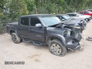 2022 Toyota Tacoma SR with VIN 3TMCZ5AN5NM459555, listed as a IAAI auction lot 40220407 with 53,212 mi miles and . Bid and sale history available at DreamBid. Image 1.
