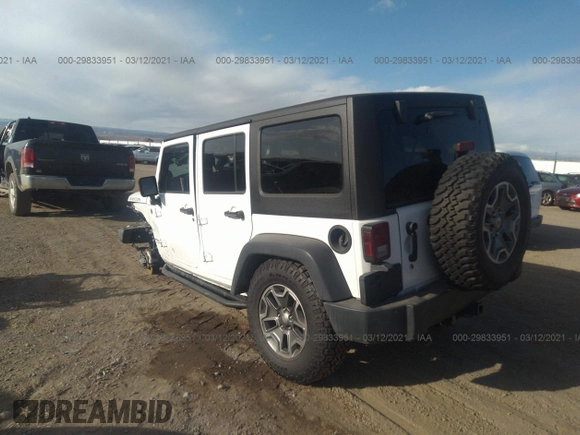 2013 Jeep Wrangler Unlimited Rubicon 10th Anniversary with VIN 1C4HJWFG0DL681417, listed as a IAAI auction lot 29833951 with 118,673 mi miles and . Bid and sale history available at DreamBid. Image 3.