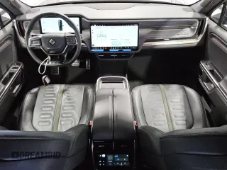 2022 Rivian R1T Adventure z VIN 7FCTGAAA5NN007486, wystawiony jako Copart lot #52649075 z przebiegiem 23 292 mil mil oraz Czysty tytuł • Clean title. Historia ofert i sprzedaży dostępna na DreamBid. Obrazek 8.