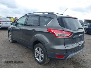 2013 Ford Escape SE with VIN 1FMCU9GX4DUC98328, listed as a IAAI auction lot 41956249 with 114,195 mi miles and . Bid and sale history available at DreamBid. Image 3.