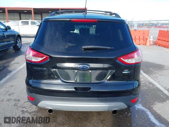 2013 Ford Escape SE with VIN 1FMCU9GX9DUB92246, listed as a IAAI auction lot 41808372 with 73,472 mi miles. Bid and sale history available at carsss.com. Image 16.