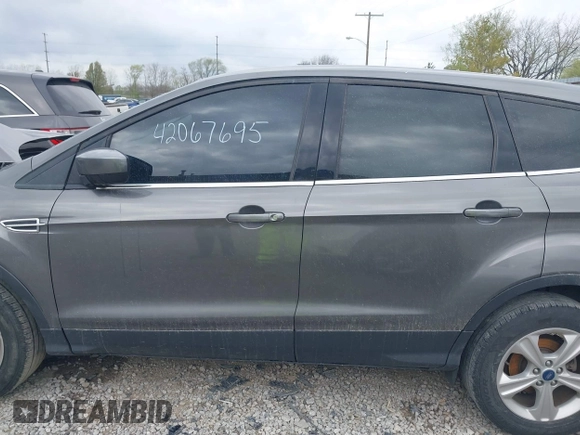 2013 Ford Escape SE with VIN 1FMCU0GX3DUC84979, listed as a IAAI auction lot 42067695 with 162,447 mi miles and . Bid and sale history available at DreamBid. Image 14.