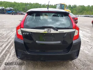 2015 Honda Fit EX-L z VIN 3HGGK5H8XFM733048, wystawiony jako IAAI lot #42267517 z przebiegiem Nie podano mil oraz . Historia ofert i sprzedaży dostępna na DreamBid. Obrazek 16.