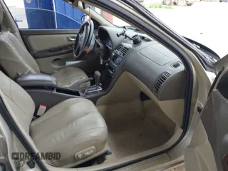 2000 Nissan Maxima GXE z VIN JN1CA31D8YT744603, wystawiony jako IAAI lot #42435490 z przebiegiem Nie podano mil oraz . Historia ofert i sprzedaży dostępna na DreamBid. Obrazek 5.