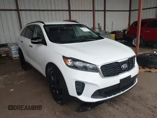 2019 Kia Sorento LX z VIN 5XYPG4A57KG609790, wystawiony jako IAAI lot #42199013 z przebiegiem 83 091 mil mil oraz . Historia ofert i sprzedaży dostępna na DreamBid. Obrazek 1.