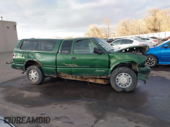 1997 GMC Sonoma SLS with VIN 1GTDT19X0V8502966, listed as a IAAI auction lot 41331331 with 308,584 mi miles. Bid and sale history available at carsss.com. Image 12.