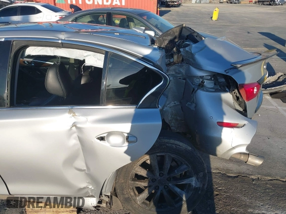 2015 Infiniti Q50 z VIN JN1BV7AP4FM341453, wystawiony jako IAAI lot #41755534 z przebiegiem Nie podano mil oraz . Historia ofert i sprzedaży dostępna na DreamBid. Obrazek 6.