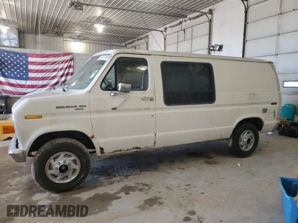 1987 Ford Econoline Cargo with VIN 1FTEE24N6HHB45016, listed as a Copart auction lot 50947745 with 62,721 mi miles and Salvage Title. Bid and sale history available at DreamBid. Image 1.