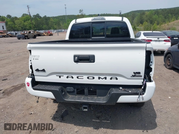 2021 Toyota Tacoma 4WD SR with VIN 3TMCZ5AN2MM414975, listed as a IAAI auction lot 41997227 with 57,729 mi miles. Bid and sale history available at carsss.com. Image 16.