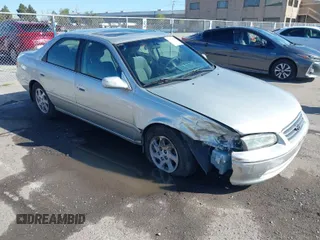2001 Toyota Camry LE z VIN JT2BF22KX10342454, wystawiony jako IAAI lot #41939743 z przebiegiem 124 045 mil mil oraz . Historia ofert i sprzedaży dostępna na DreamBid. Obrazek 1.