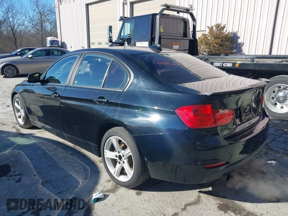 2015 BMW 3 Series 328i with VIN WBA3C1C53FK120984, listed as a IAAI auction lot 41338035 with 119,486 mi miles and . Bid and sale history available at carsss.com. Image 3.