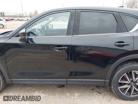 2018 Mazda CX-5 Grand Touring with VIN JM3KFBDM3J0384431, listed as a IAAI auction lot 42013474 with 65,018 mi miles. Bid and sale history available at carsss.com. Image 14.