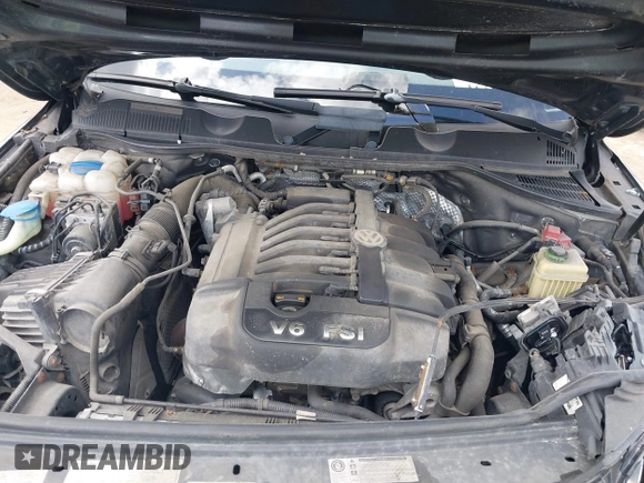 2013 Volkswagen Touareg Lux with VIN WVGEF9BP4DD006851, listed as a IAAI auction lot 41983791 with 115,551 mi miles and . Bid and sale history available at DreamBid. Image 10.