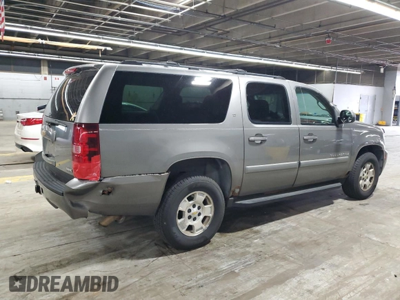 2007 Chevrolet Suburban LTZ with VIN 1GNFK163X7J231365, listed as a Copart auction lot 60885135 with 208,687 mi miles and Salvage title. Bid and sale history available at DreamBid. Image 3.