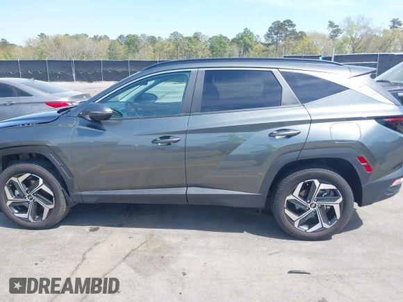 2022 Hyundai Tucson SEL z VIN 5NMJCCAE4NH096813, wystawiony jako IAAI lot #41899641 z przebiegiem 23 668 mil mil oraz . Historia ofert i sprzedaży dostępna na DreamBid. Obrazek 15.