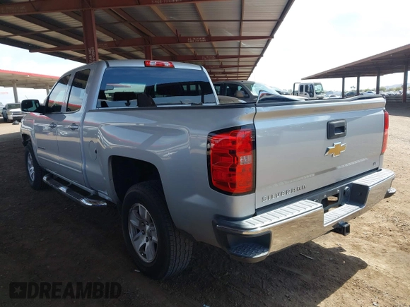 2016 Chevrolet Silverado 1500 LT with VIN 1GCRCREC3GZ185219, listed as a IAAI auction lot 41970474 with 124,101 mi miles and . Bid and sale history available at DreamBid. Image 3.