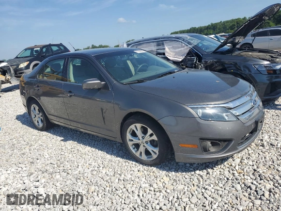 2012 Ford Fusion SE with VIN 3FAHP0HA1CR235996, listed as a Copart auction lot 61243025 with 165,218 mi miles and Salvage title. Bid and sale history available at DreamBid. Image 4.
