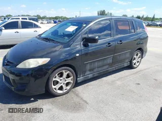 2009 Mazda 5 Sport with VIN JM1CR293290331607, listed as a IAAI auction lot 41907557 with 149,523 mi miles. Bid and sale history available at carsss.com. Image 2.