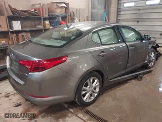 2012 Kia Optima LX with VIN 5XXGM4A73CG069032, listed as a IAAI auction lot 41939325 with 107,808 mi miles. Bid and sale history available at carsss.com. Image 4.