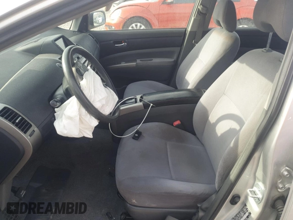 2007 Toyota Prius z VIN JTDKB20U473251436, wystawiony jako Copart lot #52282085 z przebiegiem Nie podano mil oraz Szkoda całkowita • Salvage title. Historia ofert i sprzedaży dostępna na DreamBid. Obrazek 7.