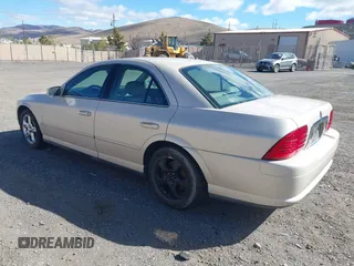 2001 Lincoln LS with VIN 1LNHM87A71Y617169, listed as a IAAI auction lot 41620883 with 130,486 mi miles. Bid and sale history available at carsss.com. Image 3.