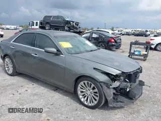 2016 Cadillac CTS Luxury Collection RWD with VIN 1G6AR5SXXG0108544, listed as a IAAI auction lot 41985630 with 86,014 mi miles and . Bid and sale history available at DreamBid. Image 1.