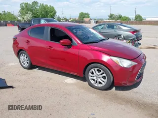 2016 Scion iA z VIN 3MYDLBZV0GY118621, wystawiony jako IAAI lot #42342512 z przebiegiem 71 193 mil mil oraz . Historia ofert i sprzedaży dostępna na DreamBid. Obrazek 1.