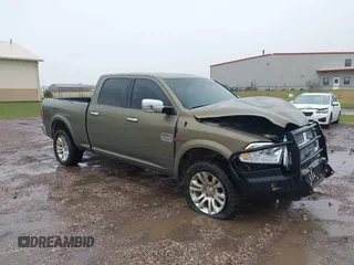 2015 Ram 1500 Laramie Limited with VIN 1C6RR7WM9FS641989, listed as a IAAI auction lot 42145348 with 208,618 mi miles and . Bid and sale history available at DreamBid. Image 1.