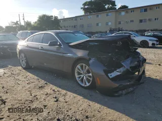2014 BMW 6 Series 640i z VIN WBA6A0C58EDZ04545, wystawiony jako Copart lot #71086984 z przebiegiem 99 048 mil mil oraz Szkoda całkowita • Salvage title. Historia ofert i sprzedaży dostępna na DreamBid. Obrazek 4.