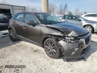 2018 Mazda CX-3 Touring z VIN JM1DKDC79J0311181, wystawiony jako Copart lot #54307795 z przebiegiem 141 348 mil mil oraz Czysty tytuł • Clean title. Historia ofert i sprzedaży dostępna na DreamBid. Obrazek 4.
