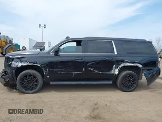 2017 Chevrolet Suburban LT with VIN 1GNSKHKCXHR194365, listed as a IAAI auction lot 42060690 with 213,424 mi miles and . Bid and sale history available at DreamBid. Image 14.