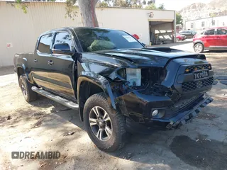 2017 Toyota Tacoma SR5 with VIN 3TMBZ5DN4HM010542, listed as a IAAI auction lot 42395280 with 119,735 mi miles and . Bid and sale history available at DreamBid. Image 1.
