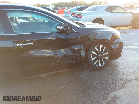 2018 Nissan Altima SR with VIN 1N4AL3AP7JC129741, listed as a IAAI auction lot 40923554 with 161,218 mi miles and . Bid and sale history available at carsss.com. Image 18.