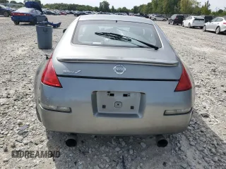 2005 Nissan 350Z with VIN JN1AZ34D05M606703, listed as a Copart auction lot 69631414 with 133,519 mi miles and Salvage Title. Bid and sale history available at carsss.com. Image 6.