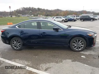 2021 Mazda 6 Sport with VIN JM1GL1UM2M1603864, listed as a IAAI auction lot 40888687 with 36,311 mi miles and . Bid and sale history available at carsss.com. Image 13.