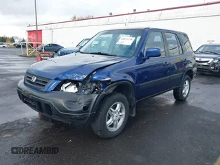 1999 Honda CR-V EX with VIN JHLRD1863XC046654, listed as a IAAI auction lot 40871270 with 220,642 mi miles. Bid and sale history available at carsss.com. Image 6.