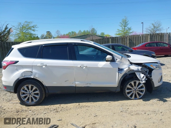 2017 Ford Escape Titanium with VIN 1FMCU9J96HUE21191, listed as a IAAI auction lot 42006013 with 71,786 mi miles. Bid and sale history available at carsss.com. Image 13.