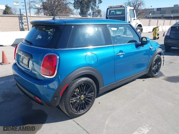 2024 MINI Hardtop 2 Door Cooper SE with VIN WMW13DJ01R2V90046, listed as a IAAI auction lot 41448064 with 3,963 mi miles. Bid and sale history available at carsss.com. Image 4.
