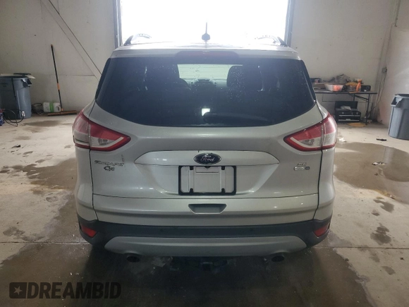 2014 Ford Escape SE z VIN 1FMCU9G97EUC43696, wystawiony jako Copart lot #57409665 z przebiegiem 68 586 mil mil oraz Czysty tytuł • Clean title. Historia ofert i sprzedaży dostępna na DreamBid. Obrazek 6.