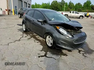 2019 Ford Fiesta SE z VIN 3FADP4EJ4KM115566, wystawiony jako Copart lot #55336615 z przebiegiem 202 912 mil mil oraz Szkoda całkowita • Salvage title. Historia ofert i sprzedaży dostępna na DreamBid. Obrazek 13.