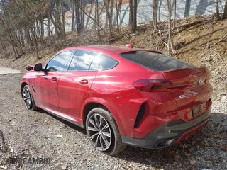 2021 BMW X6 xDrive40i with VIN 5UXCY6C01M9F72797, listed as a IAAI auction lot 41810317 with 16,084 mi miles. Bid and sale history available at carsss.com. Image 3.