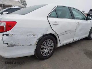 2014 Toyota Camry L with VIN 4T4BF1FK1ER416128, listed as a IAAI auction lot 42030370 with 79,475 mi miles and . Bid and sale history available at DreamBid. Image 18.