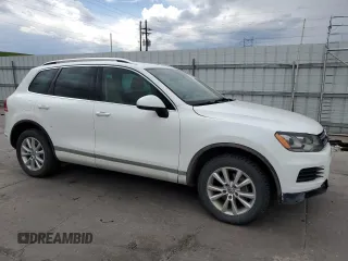 2013 Volkswagen Touareg Exec z VIN WVGEF9BP6DD001991, wystawiony jako Copart lot #58447175 z przebiegiem 170 264 mil mil oraz Tytuł czysty. Historia ofert i sprzedaży dostępna na DreamBid. Obrazek 4.